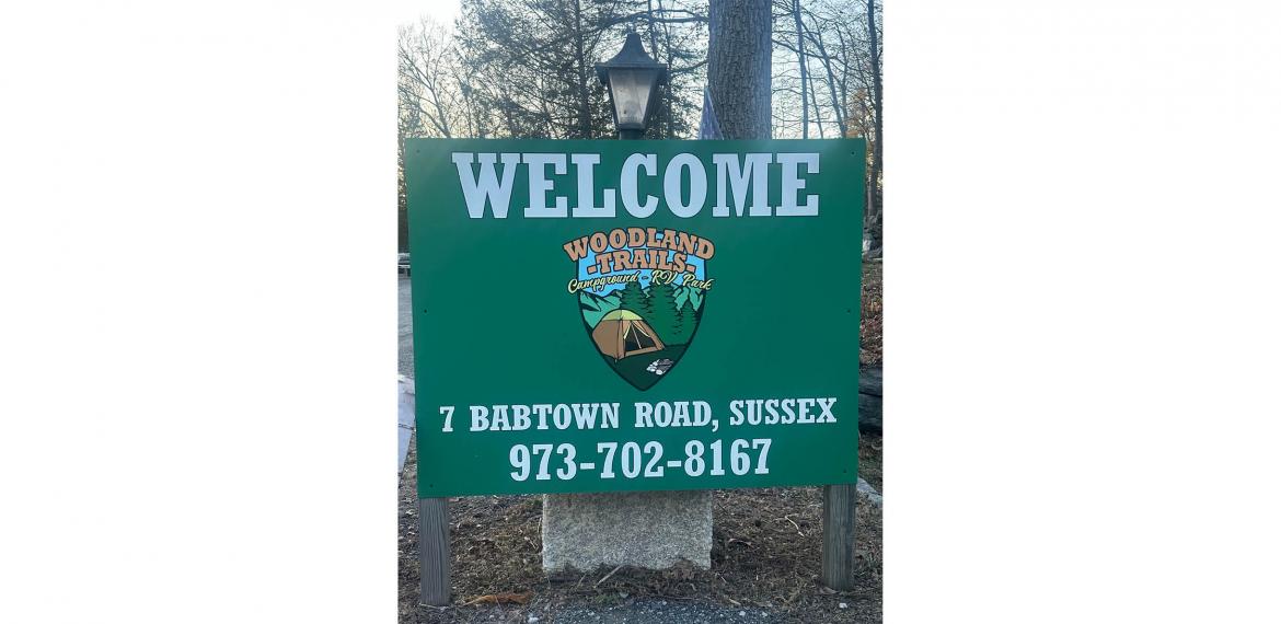 Woodland Trails Campground Sign